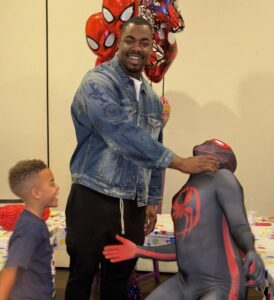 Kansas City Chiefs Chris Jones easily handles our Spiderman with one hand.